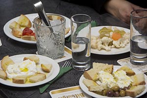 Local tsipouro and ouzo accompanied by tasty homemade appetizers!